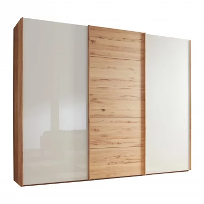 Schwebetürenschrank – B. ca. 300 cm, Astkernbuche Teilmassiv, Mitteltür Massivholz, Glas Champagner